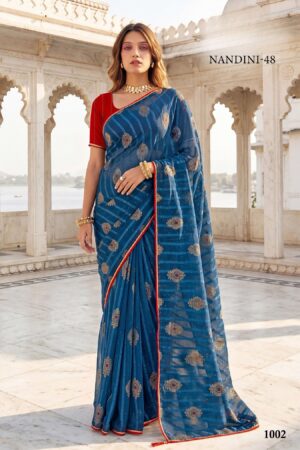Nandini-48 | Blue Georgette Saree with Golden Embroidered Bootis & Red Lace Border